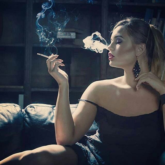 Smoking danni blowing incredibly sexy smoke