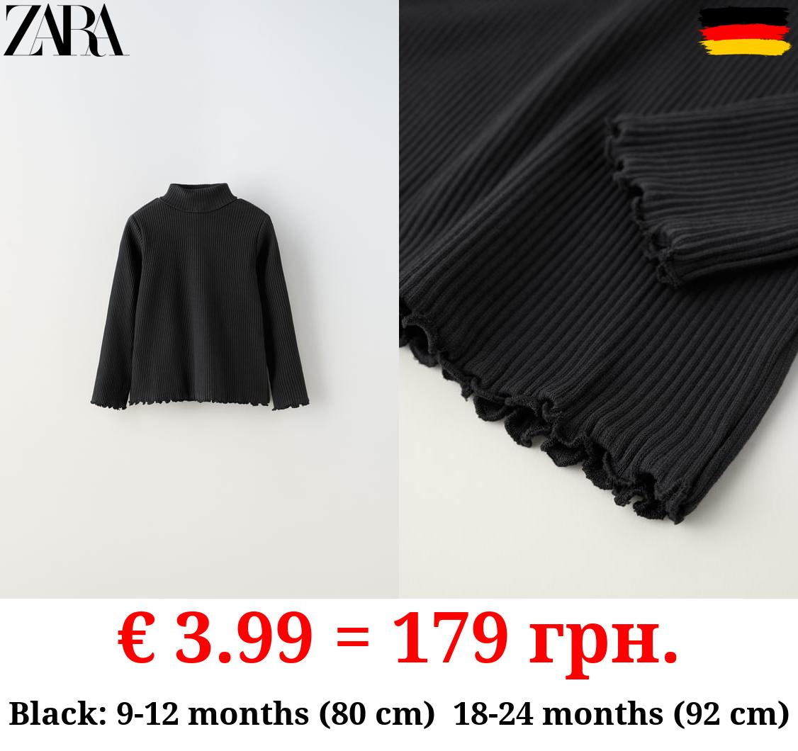 RIBBED TOP WITH SCALLOPED DETAILS