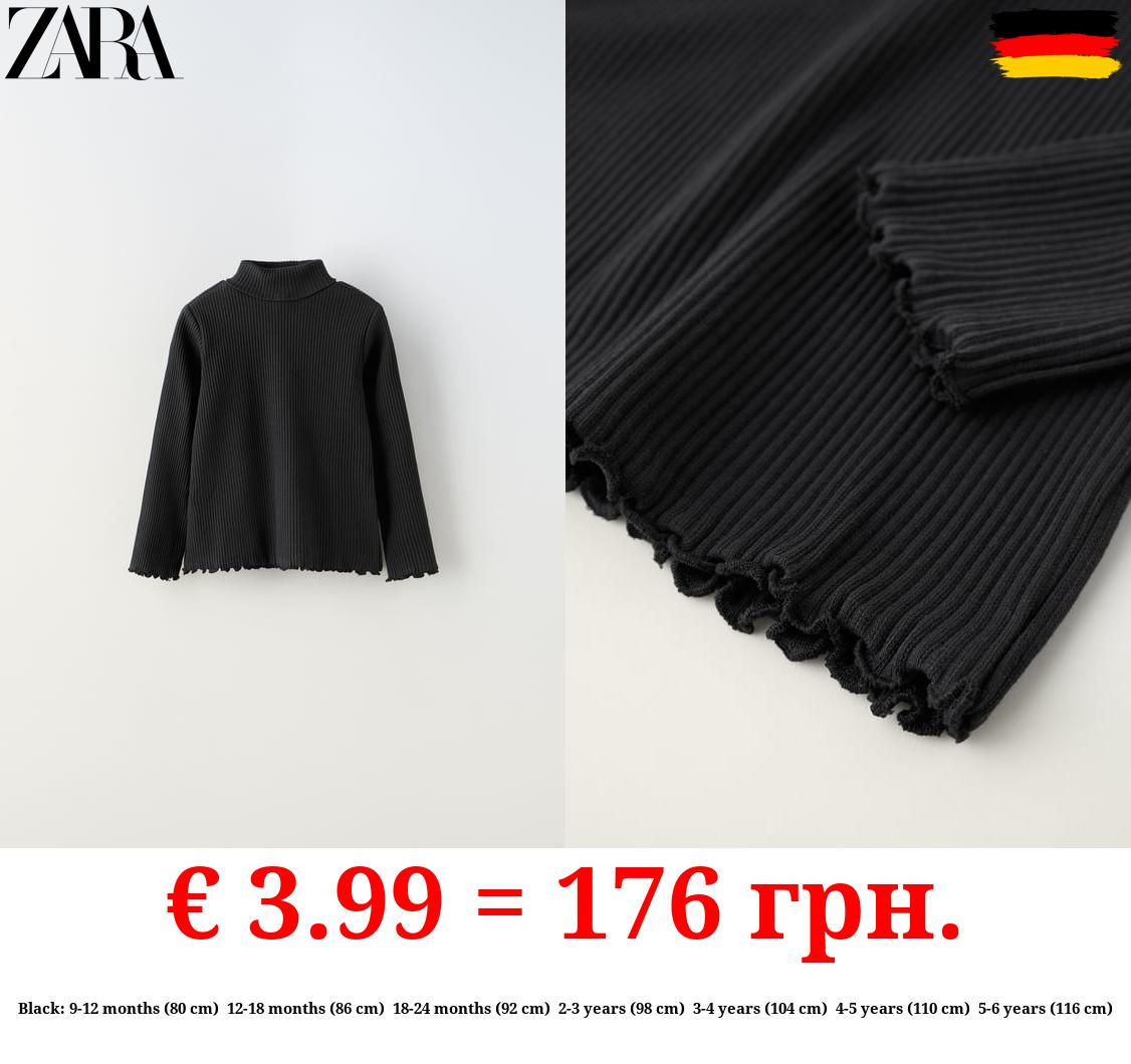 RIBBED TOP WITH SCALLOPED DETAILS