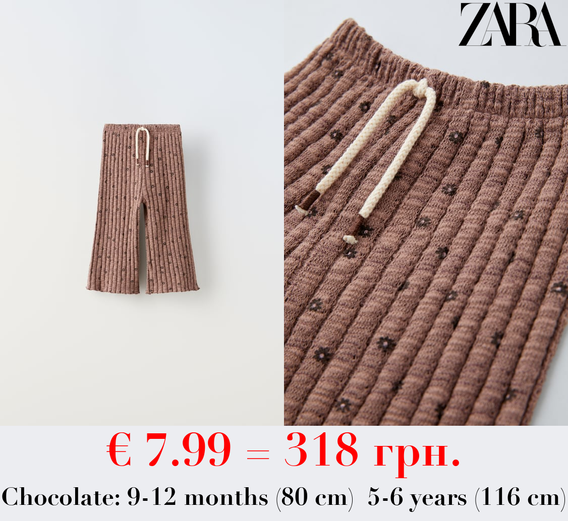 TEXTURED FLORAL PRINT TROUSERS