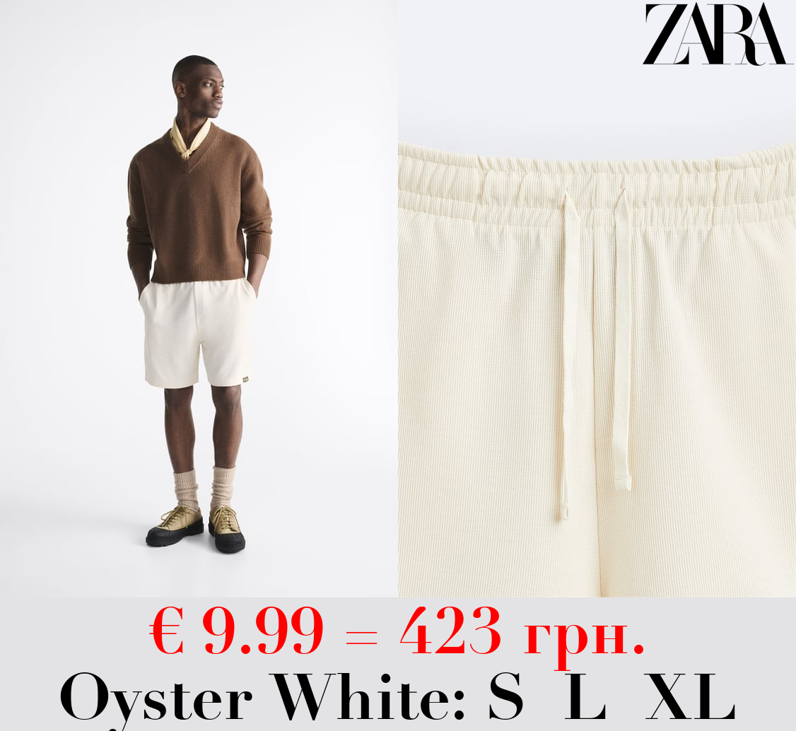 TEXTURED BERMUDA SHORTS WITH LABEL