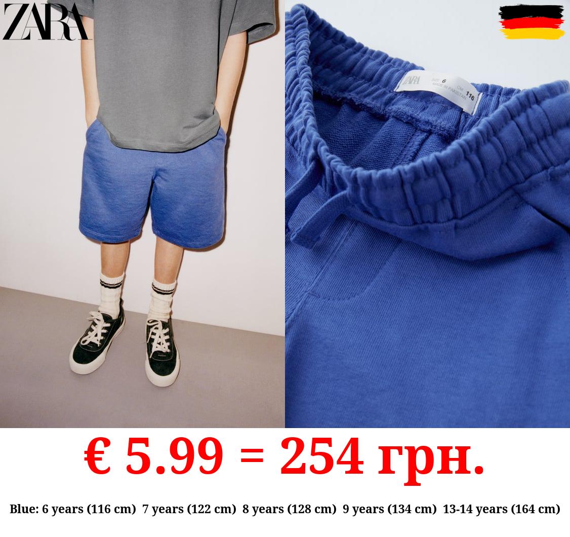 PLUSH BERMUDA SHORTS