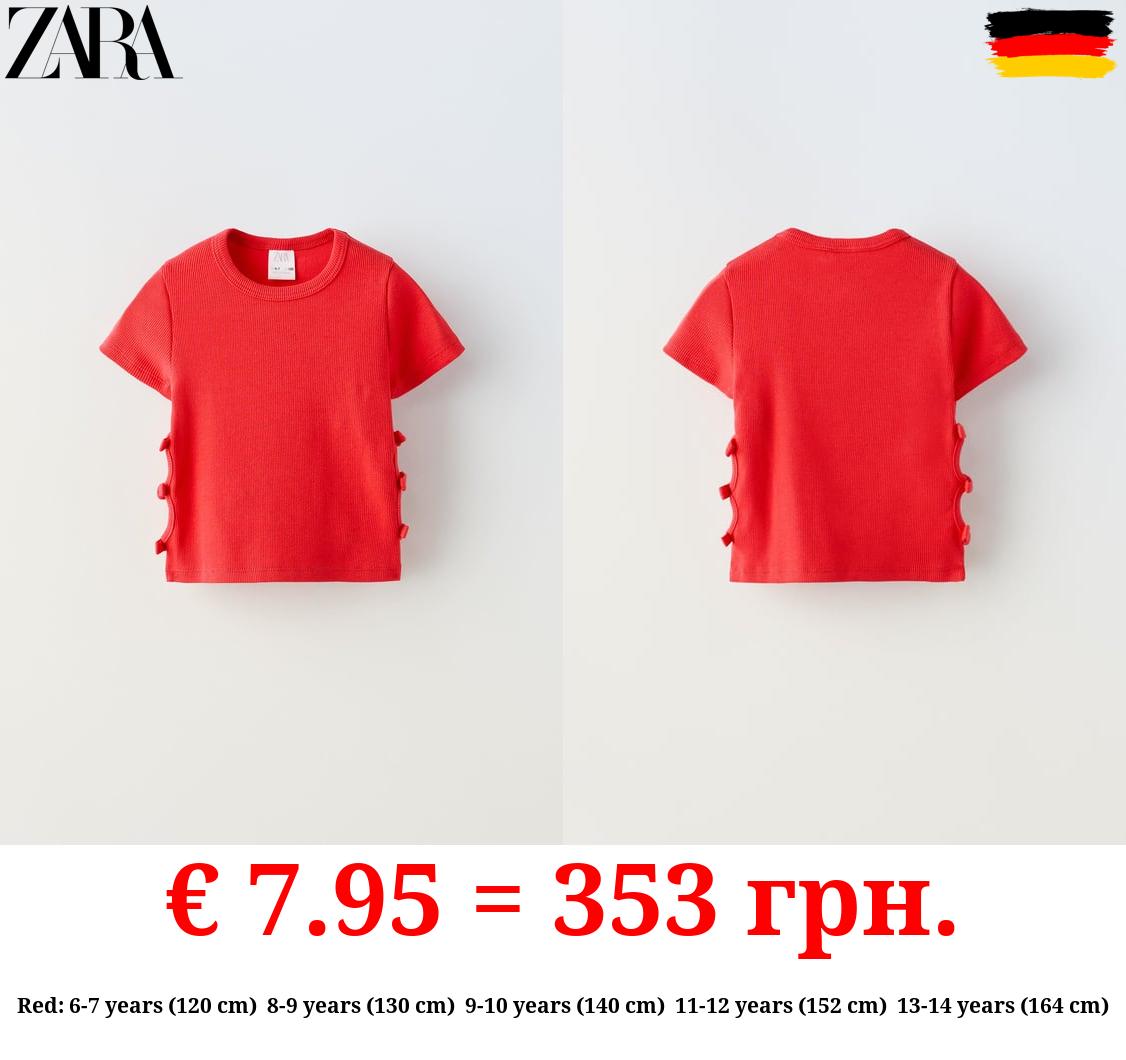 CUT-OUT T-SHIRT WITH BOWS