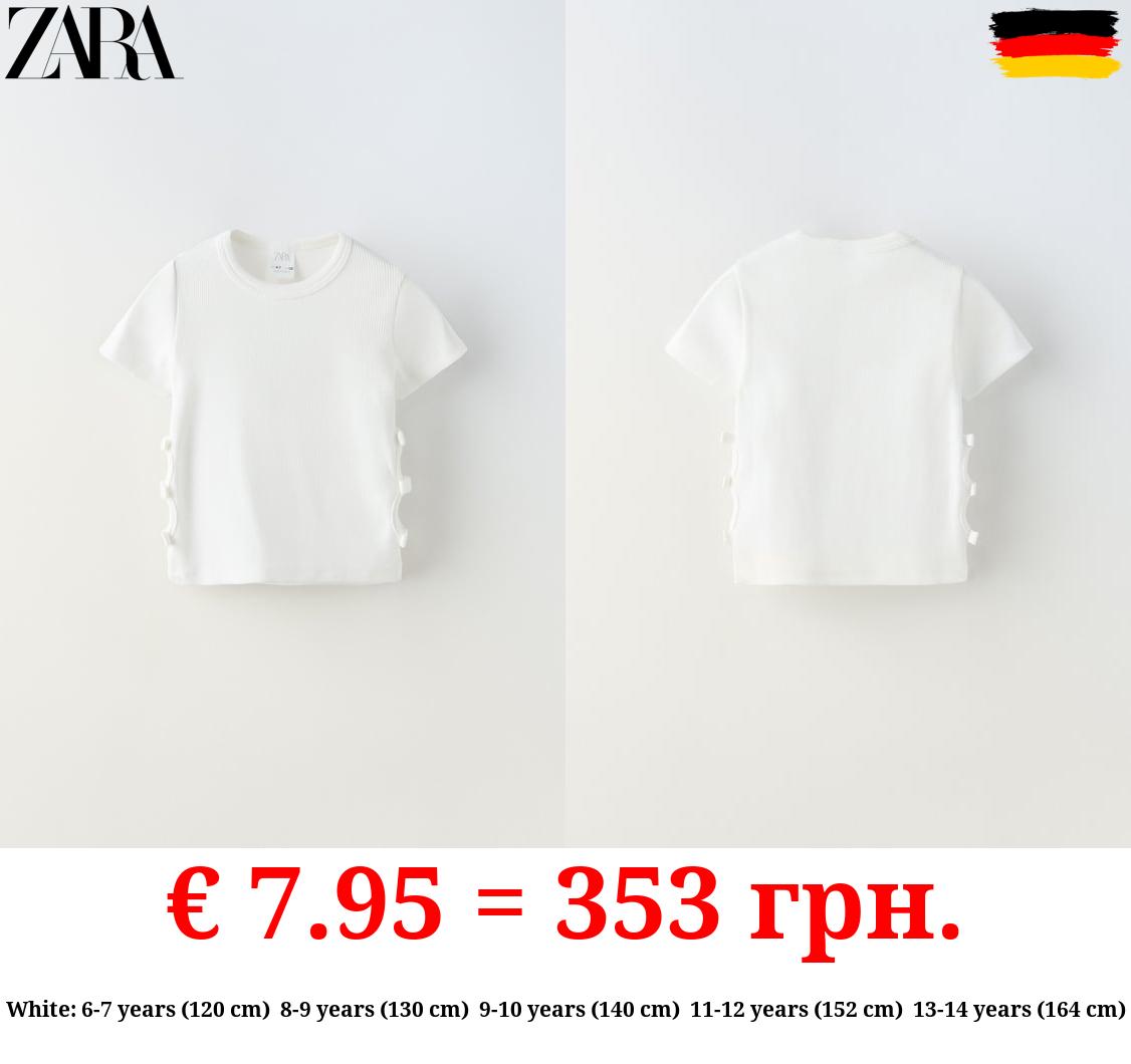 CUT-OUT T-SHIRT WITH BOWS