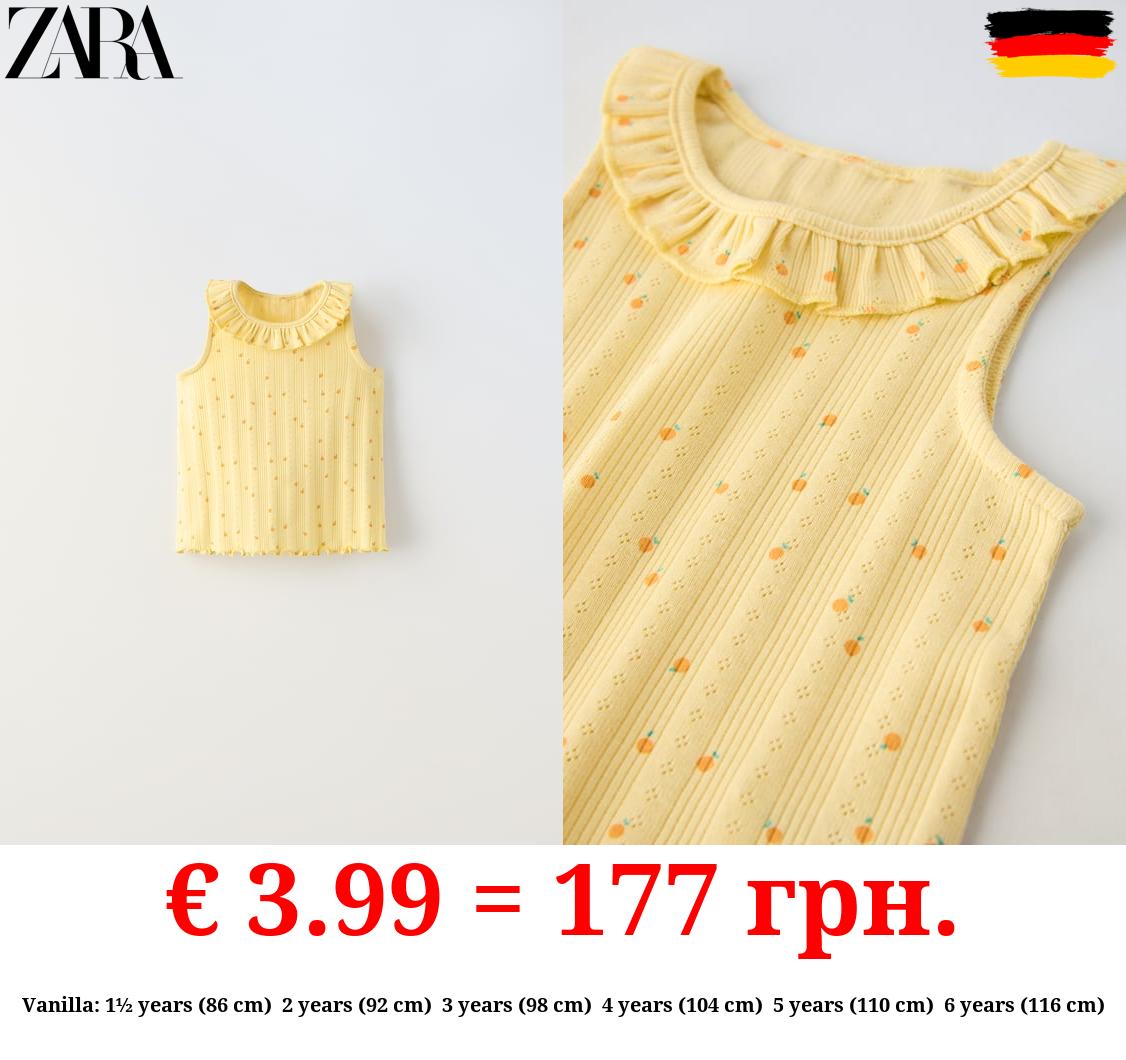 OPEN KNIT FLORAL T-SHIRT WITH RUFFLES