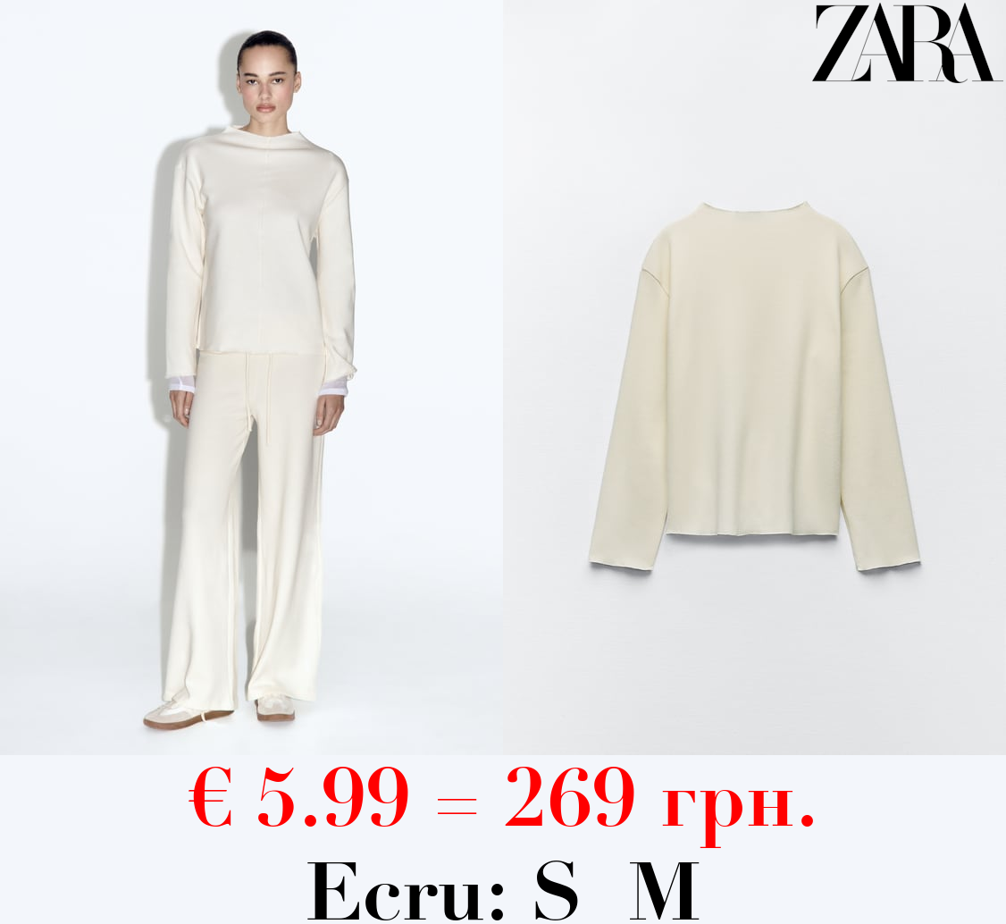 SOFT SWEATER WITH FRONT SEAM