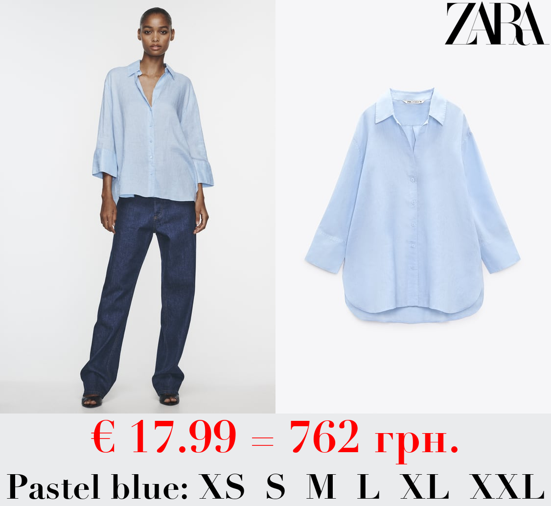 LINEN SHIRT WITH AN ASYMMETRIC HEM