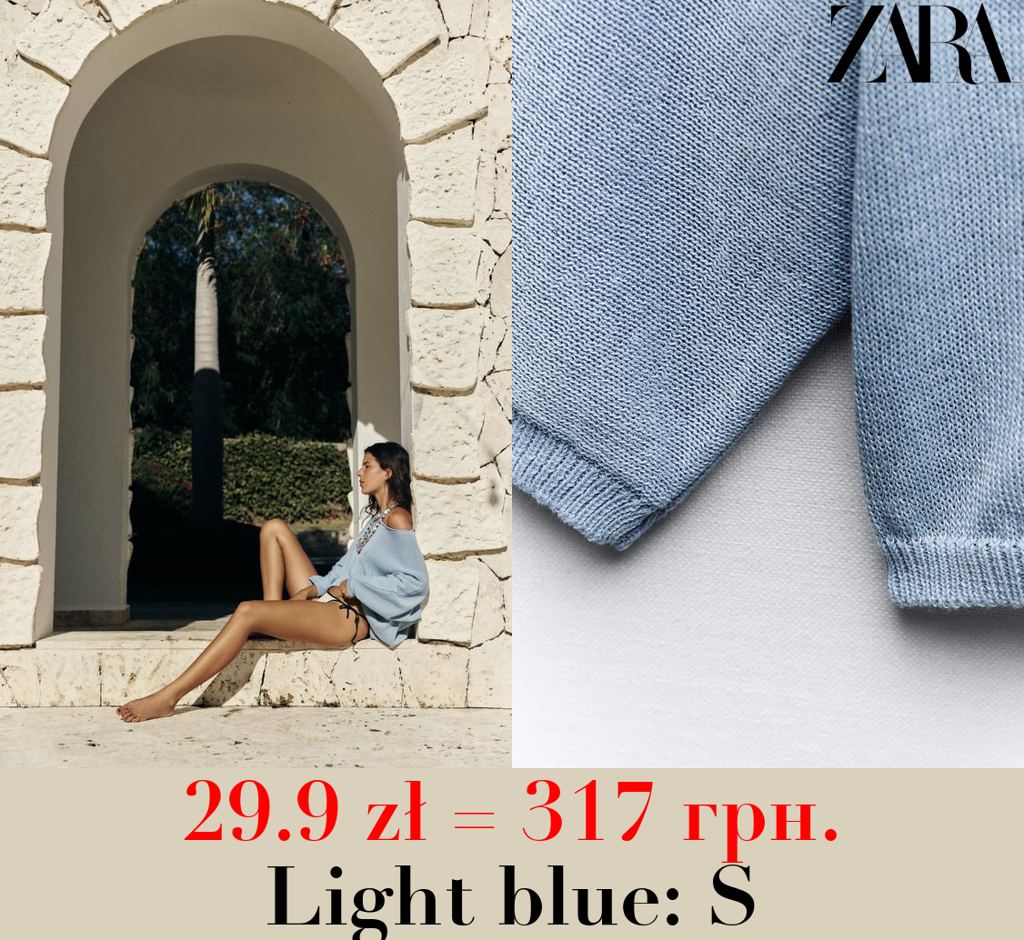 PLAIN KNIT SWEATER WITH CENTRAL SEAM