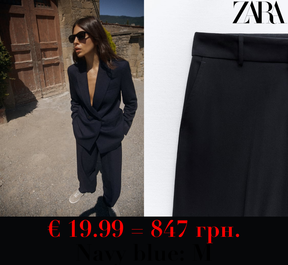 STRAIGHT-LEG TROUSERS WITH TURN-UP HEMS