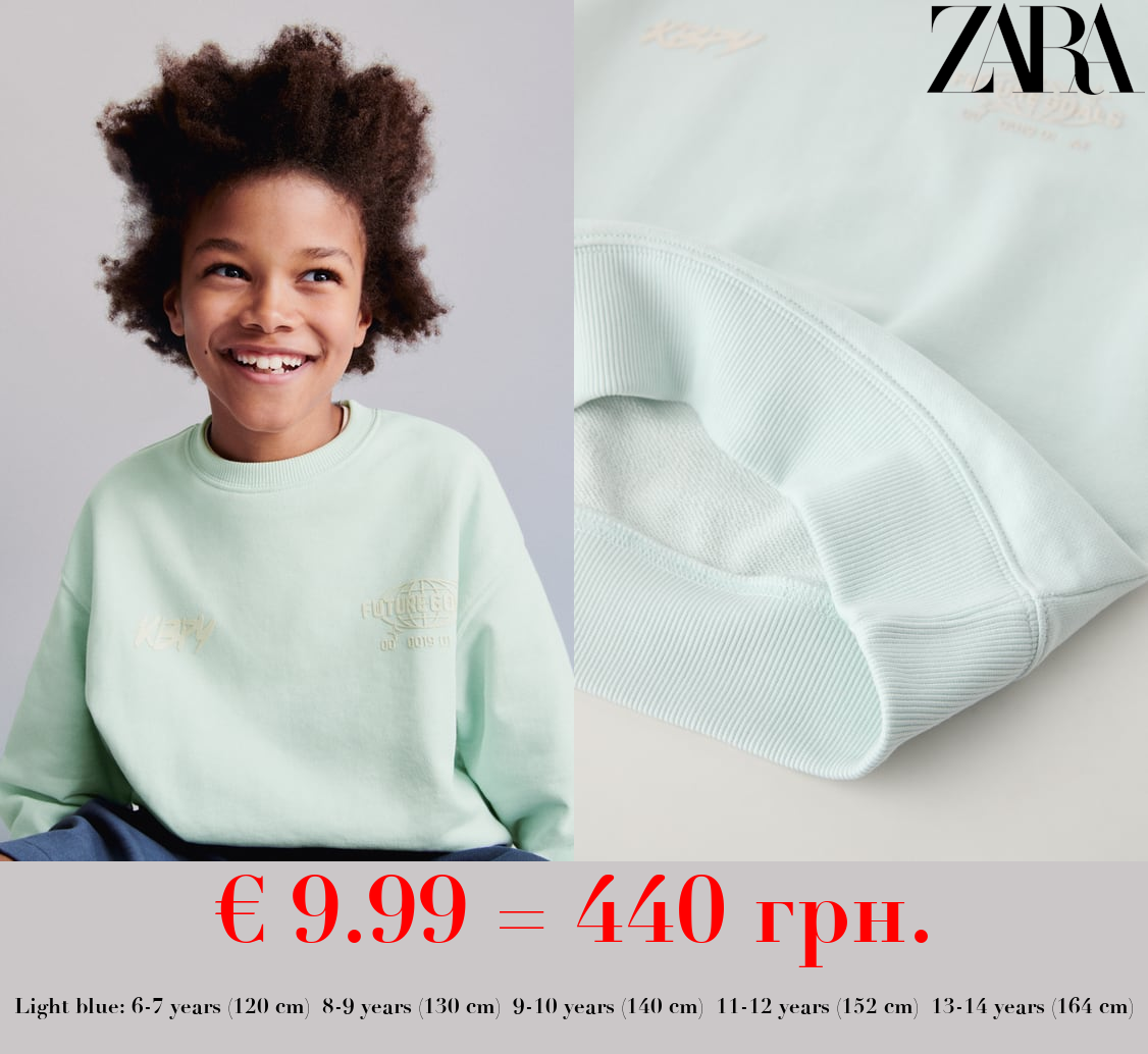 SWEATSHIRT WITH RAISED SLOGAN