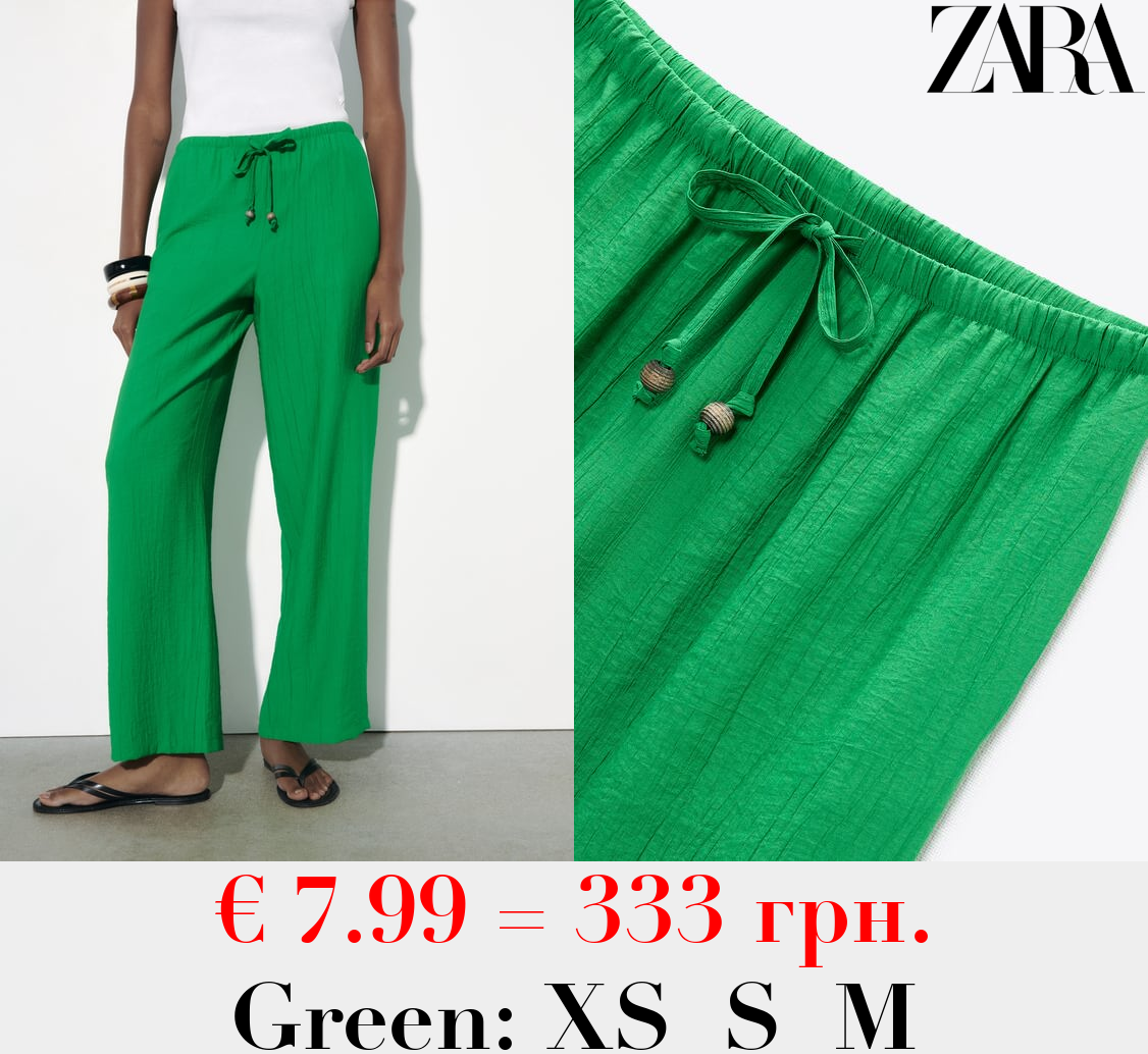 EXTRA-LONG CREASED EFFECT TROUSERS