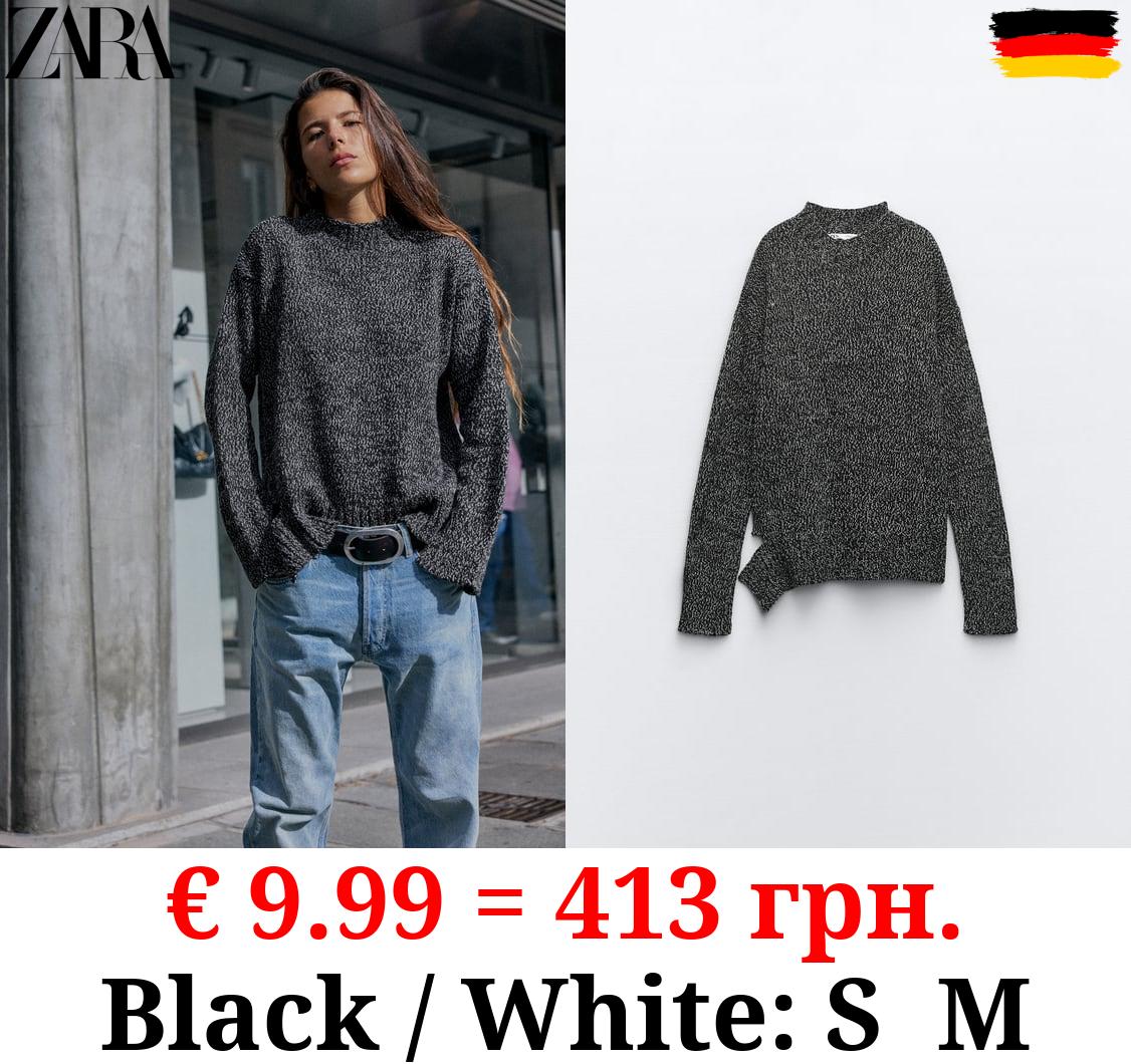 TWISTED YARN KNIT SWEATER WITH VENT AT THE HEM