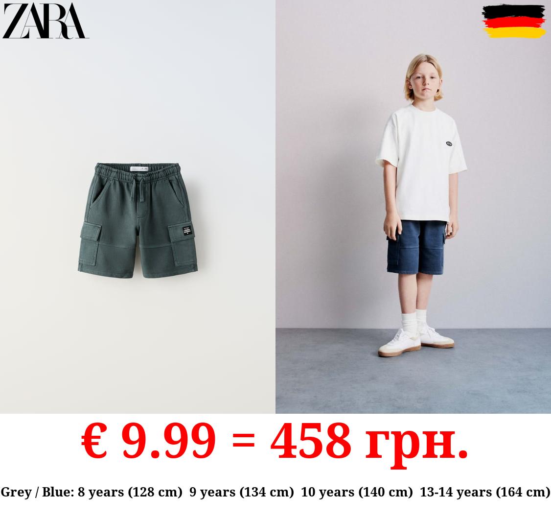 CARGO BERMUDA SHORTS WITH LABEL