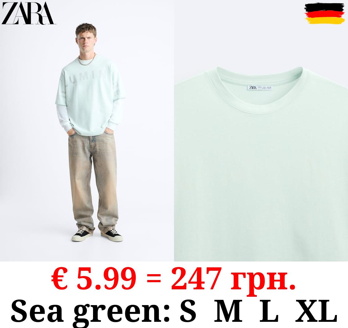 T-SHIRT WITH SUNLIGHT-REACTIVE SLOGAN