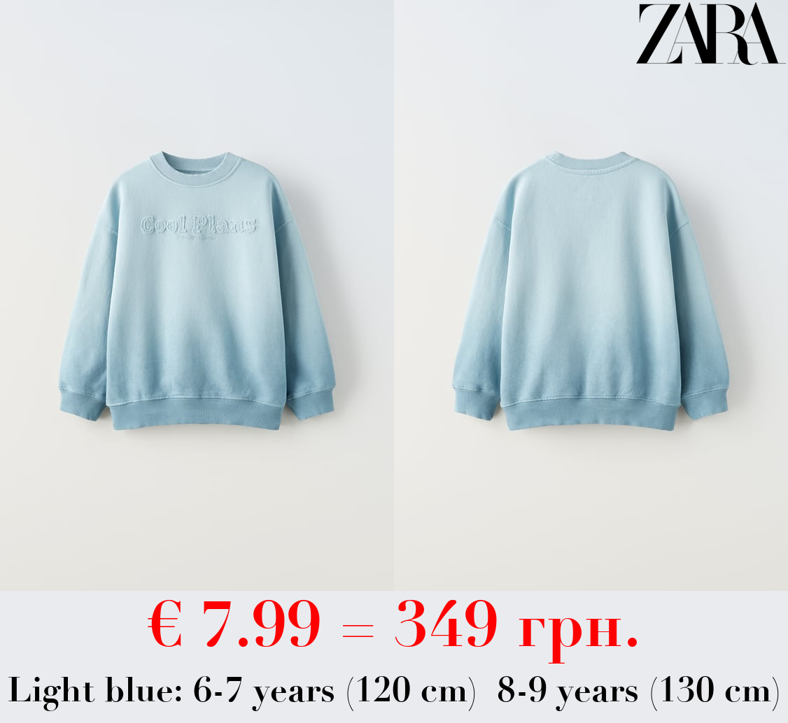 SWEATSHIRT WITH SLOGAN PATCH