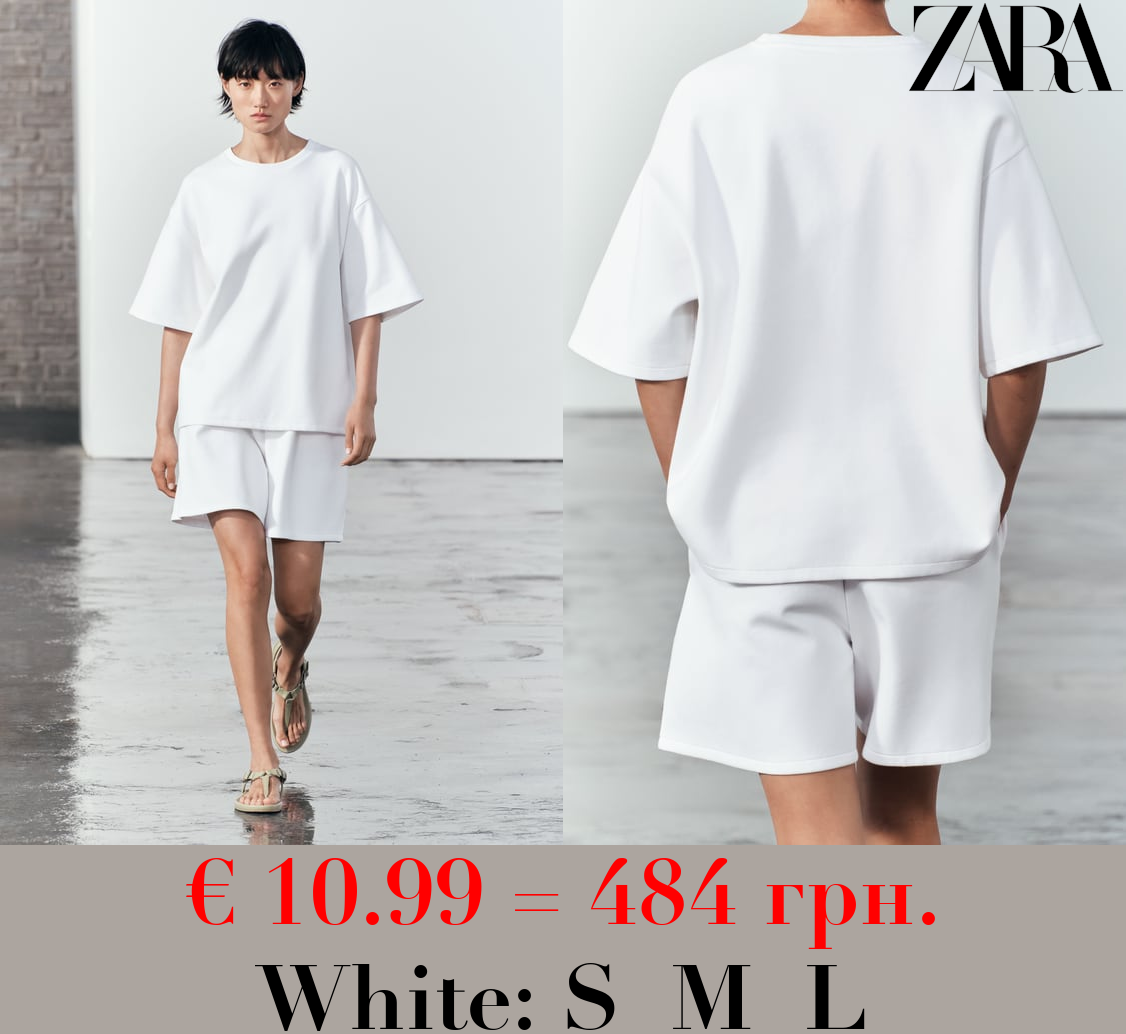 SHORT SLEEVE INTERLOCK SWEATSHIRT