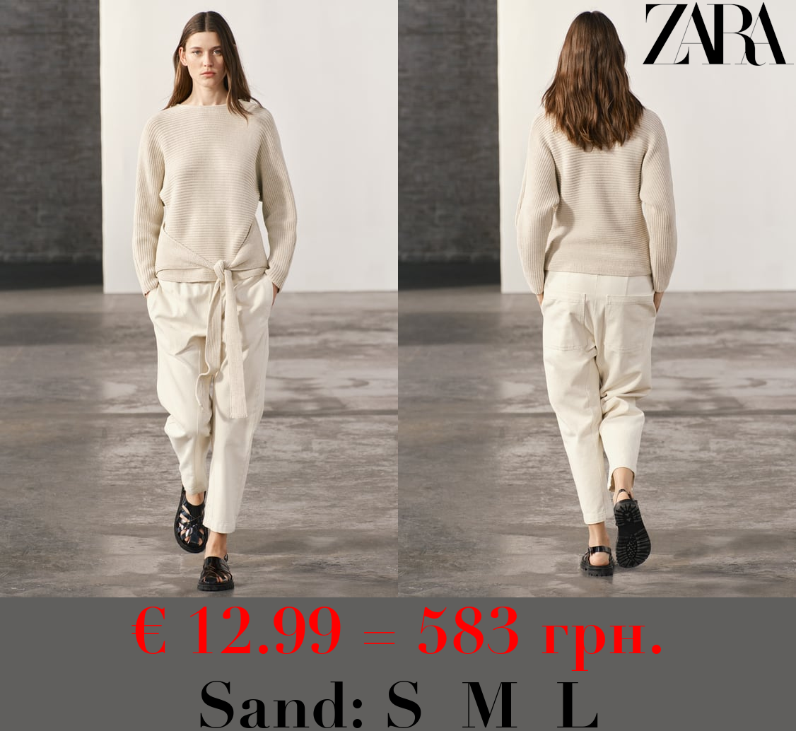 PLAIN KNIT SWEATER WITH TIE