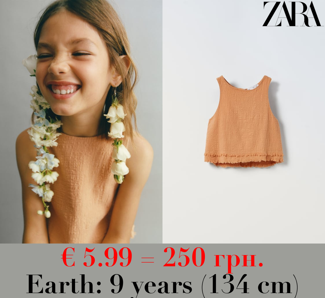 TEXTURED CUT-OUT BLOUSE