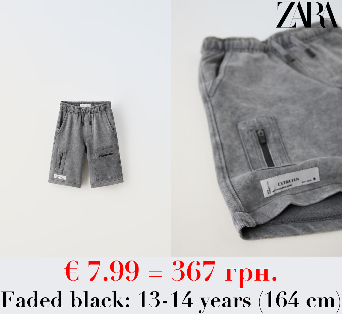 BERMUDA SHORTS WITH ZIPS AND LABELS