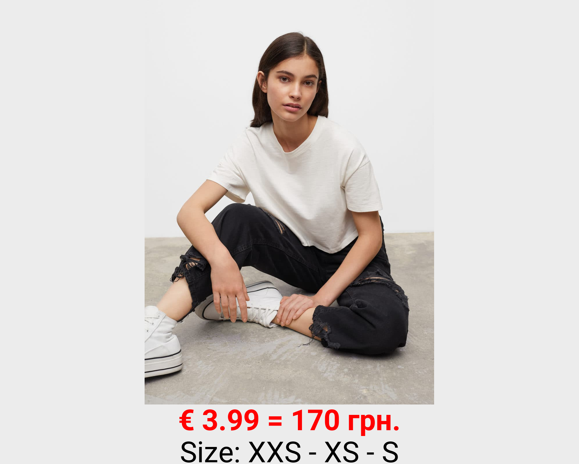 Jeans rectos bajo deshilachado