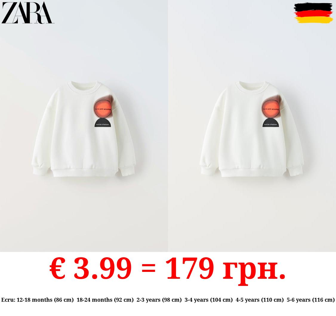 SWEATSHIRT WITH RAISED SLOGAN