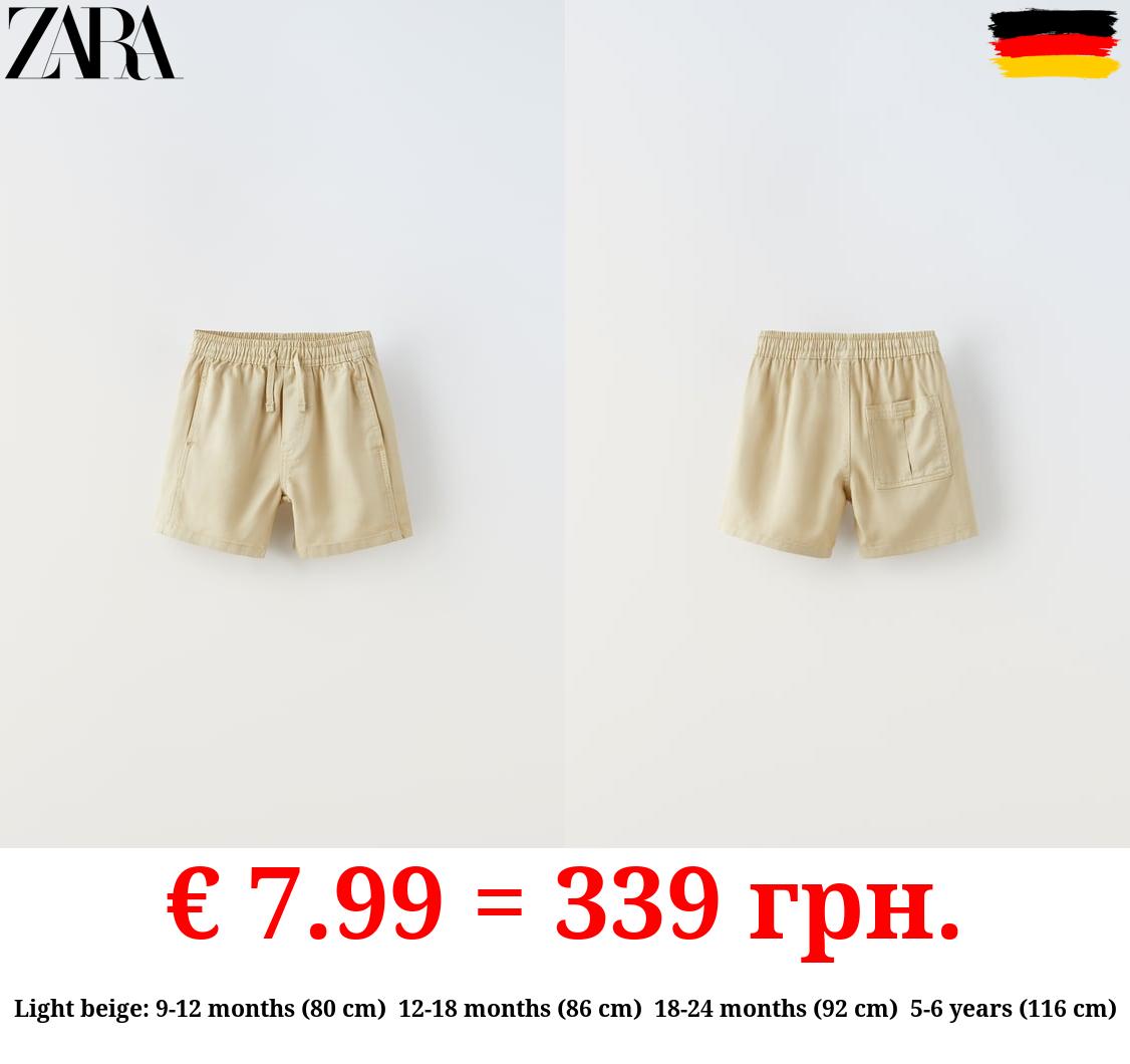 LOOSE-FITTING TWILL BERMUDA SHORTS