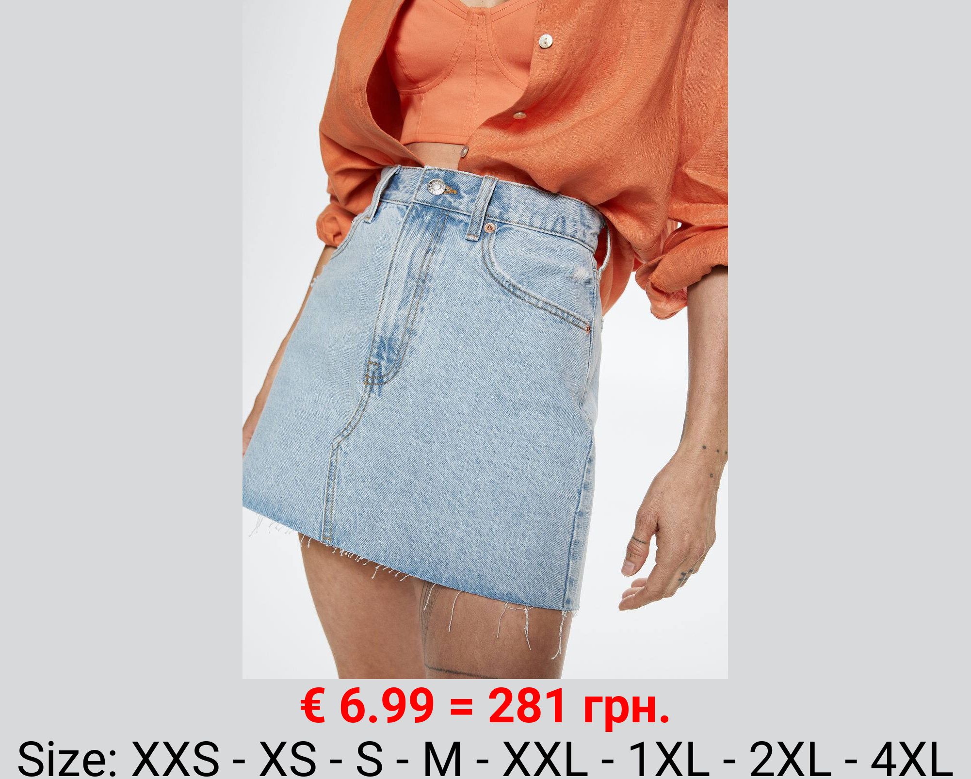 Minifalda vaquera bajo deshilachado