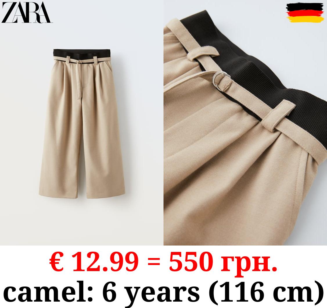 TROUSERS WITH DARTS AND ELASTIC DETAIL