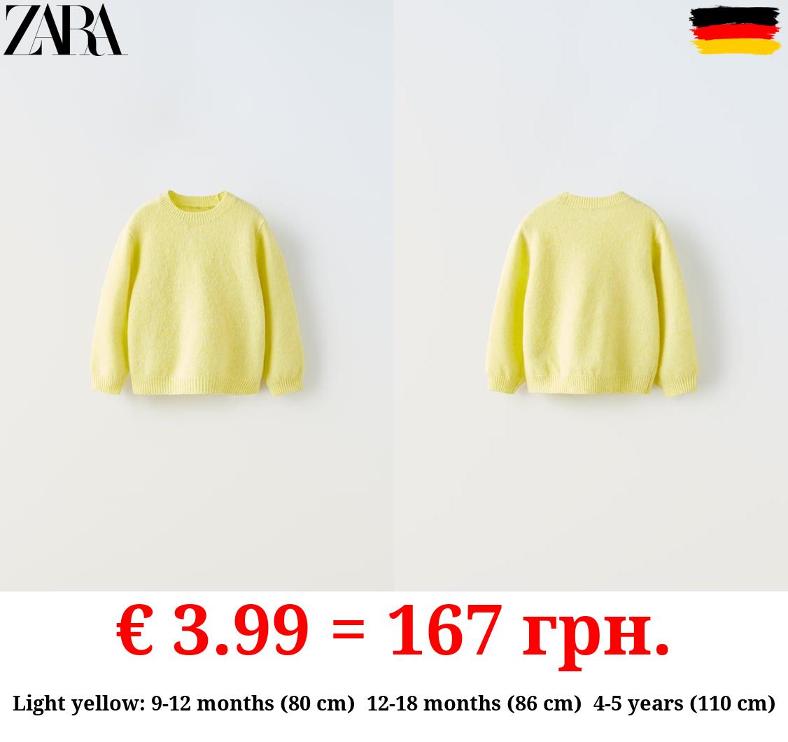 SOFT TOUCH KNIT SWEATER