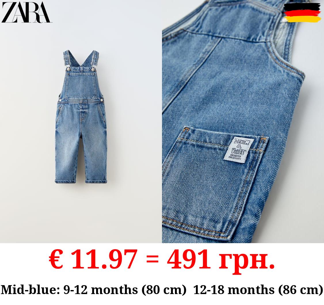 DENIM DUNGAREES WITH LABEL APPLIQUÉ