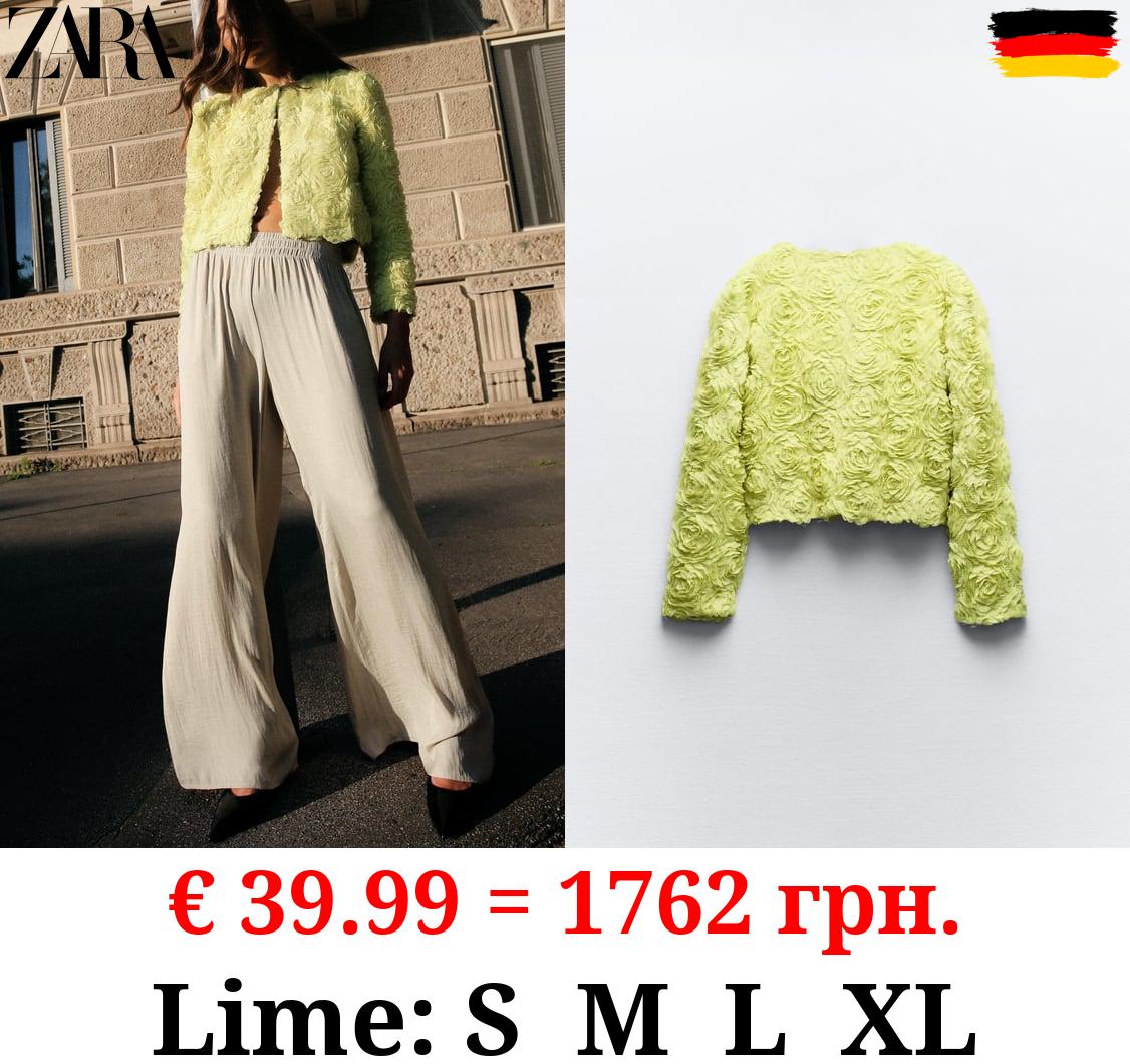 JACKET WITH TEXTURED FLOWER DETAIL