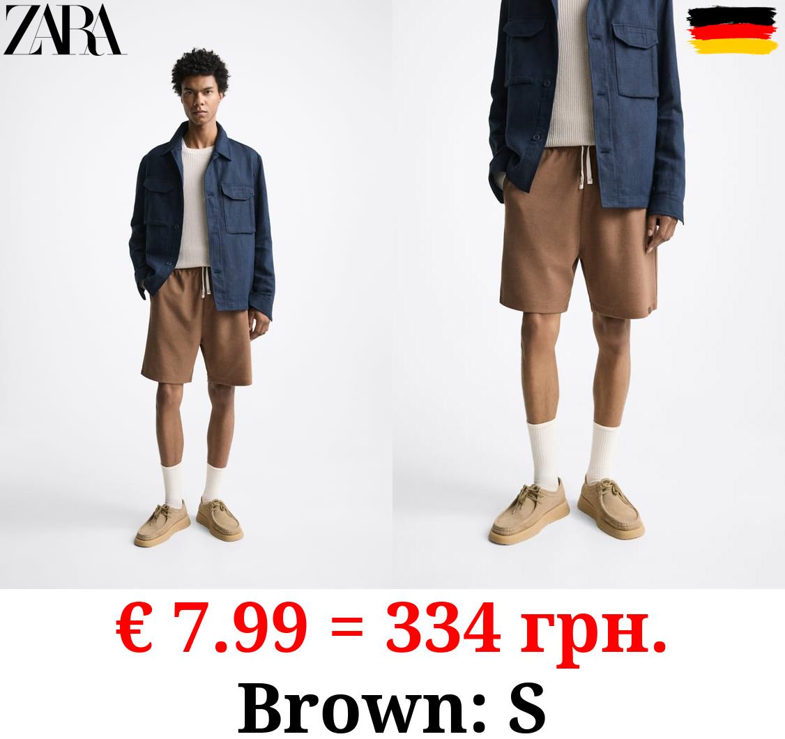 TEXTURED BERMUDA SHORTS WITH LABEL