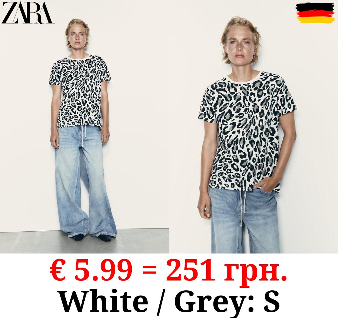 BASIC T-SHIRT WITH ASYMMETRIC HEM