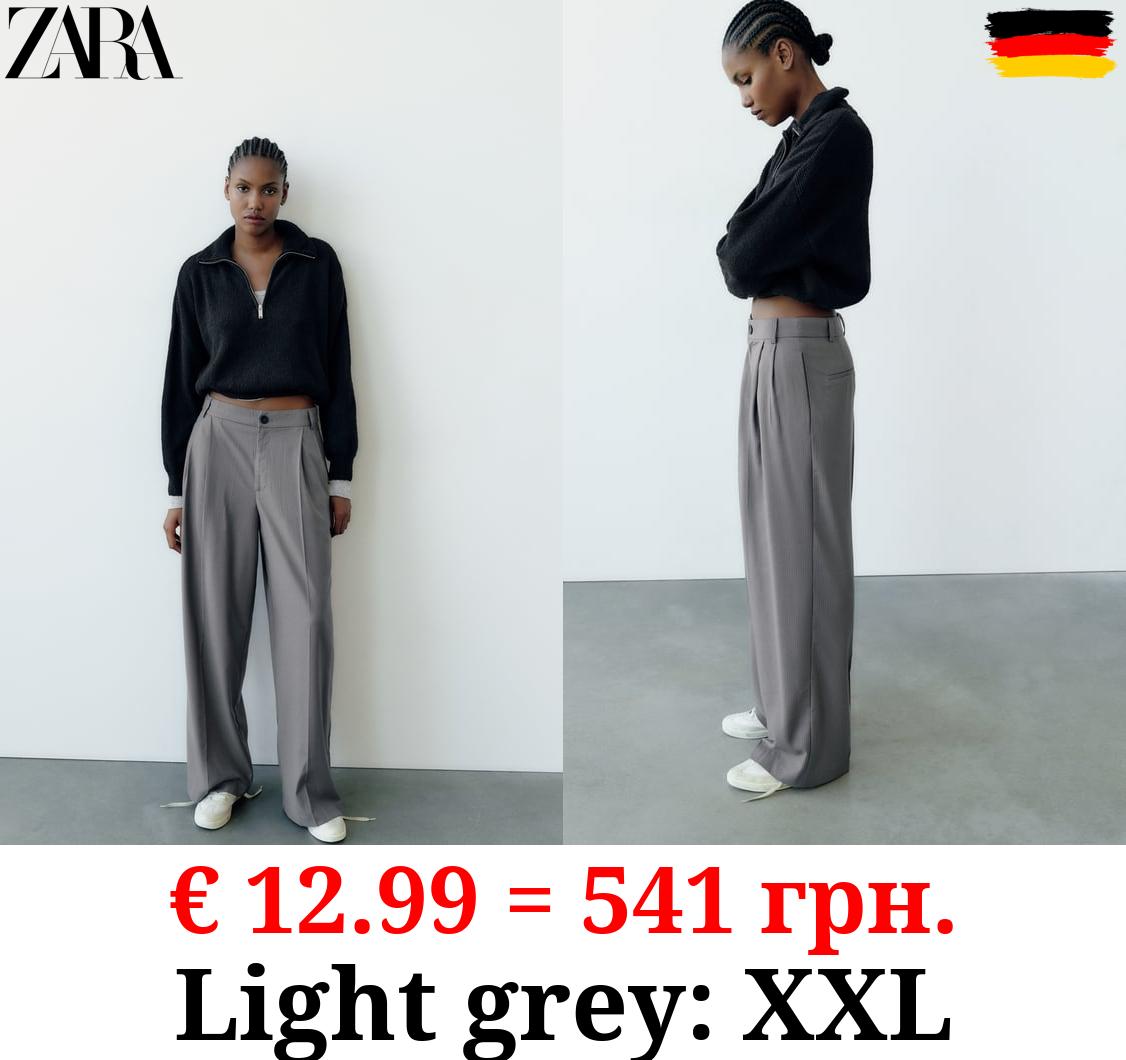 FULL-LENGTH PLEATED TROUSERS