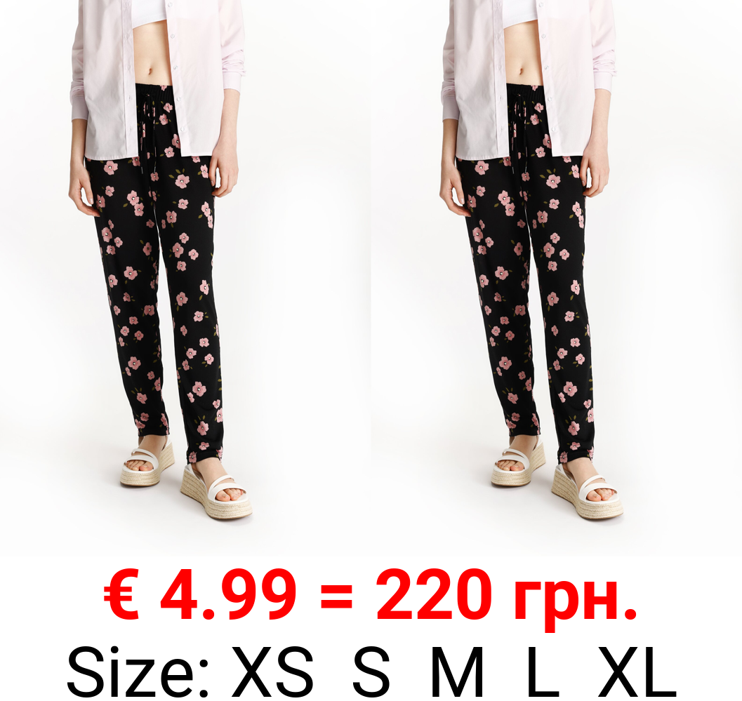 Flowing trousers with tie