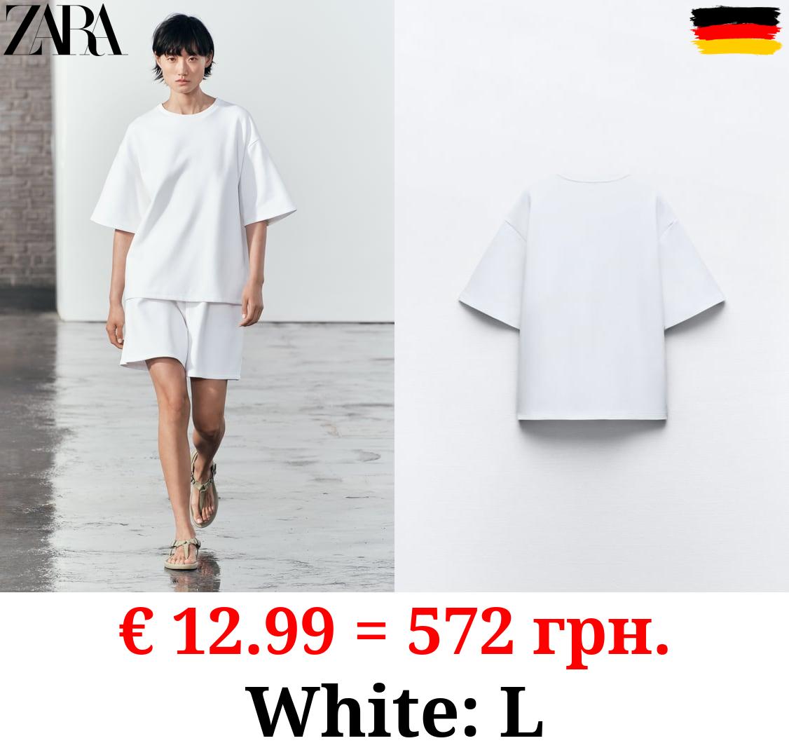 SHORT SLEEVE INTERLOCK SWEATSHIRT