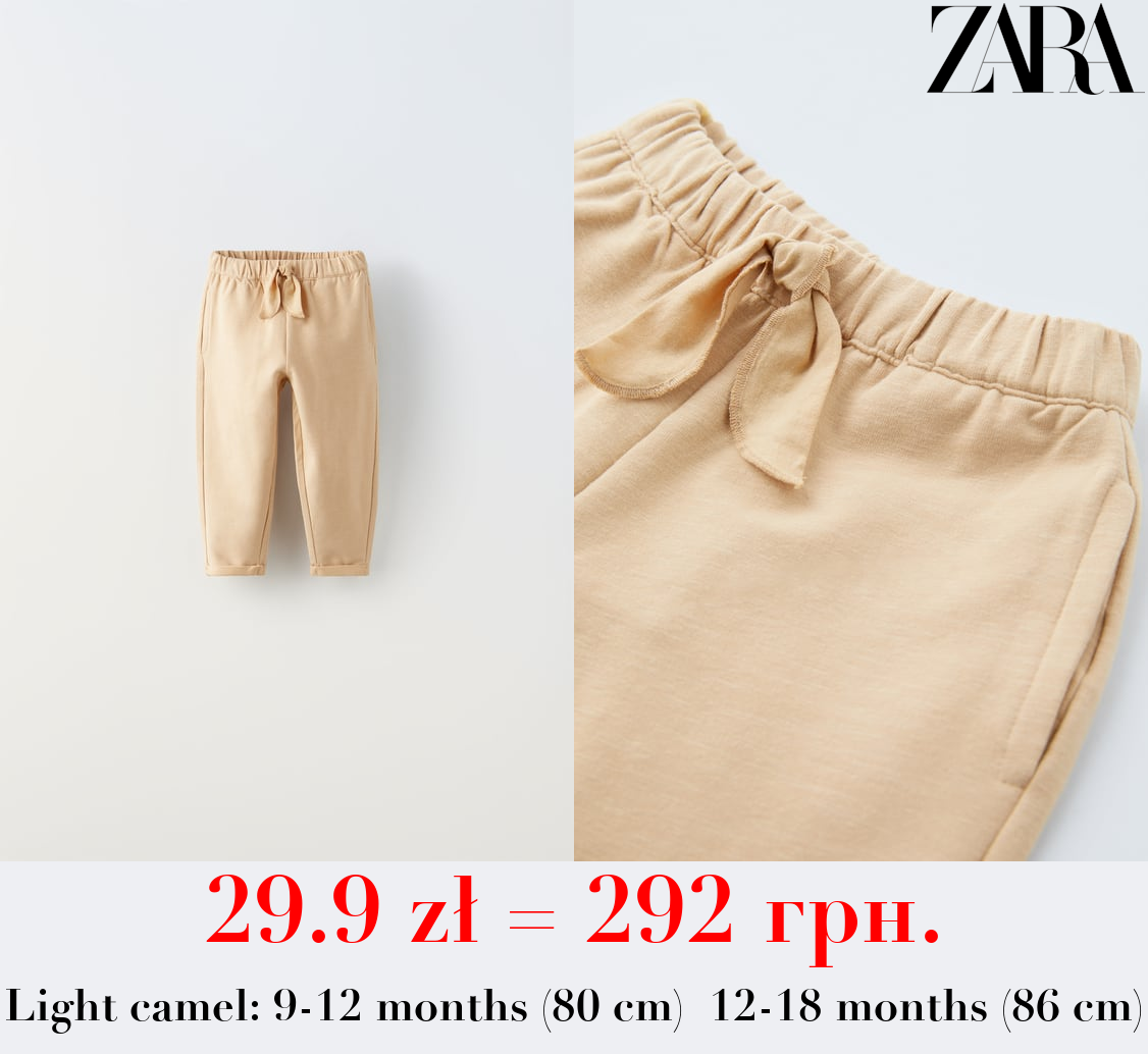 BOHO-STYLE TROUSERS WITH BOW