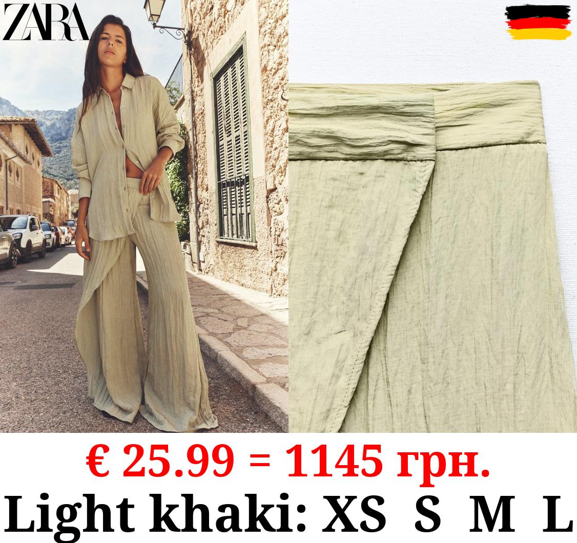 CREASED-EFFECT WRAP TROUSERS