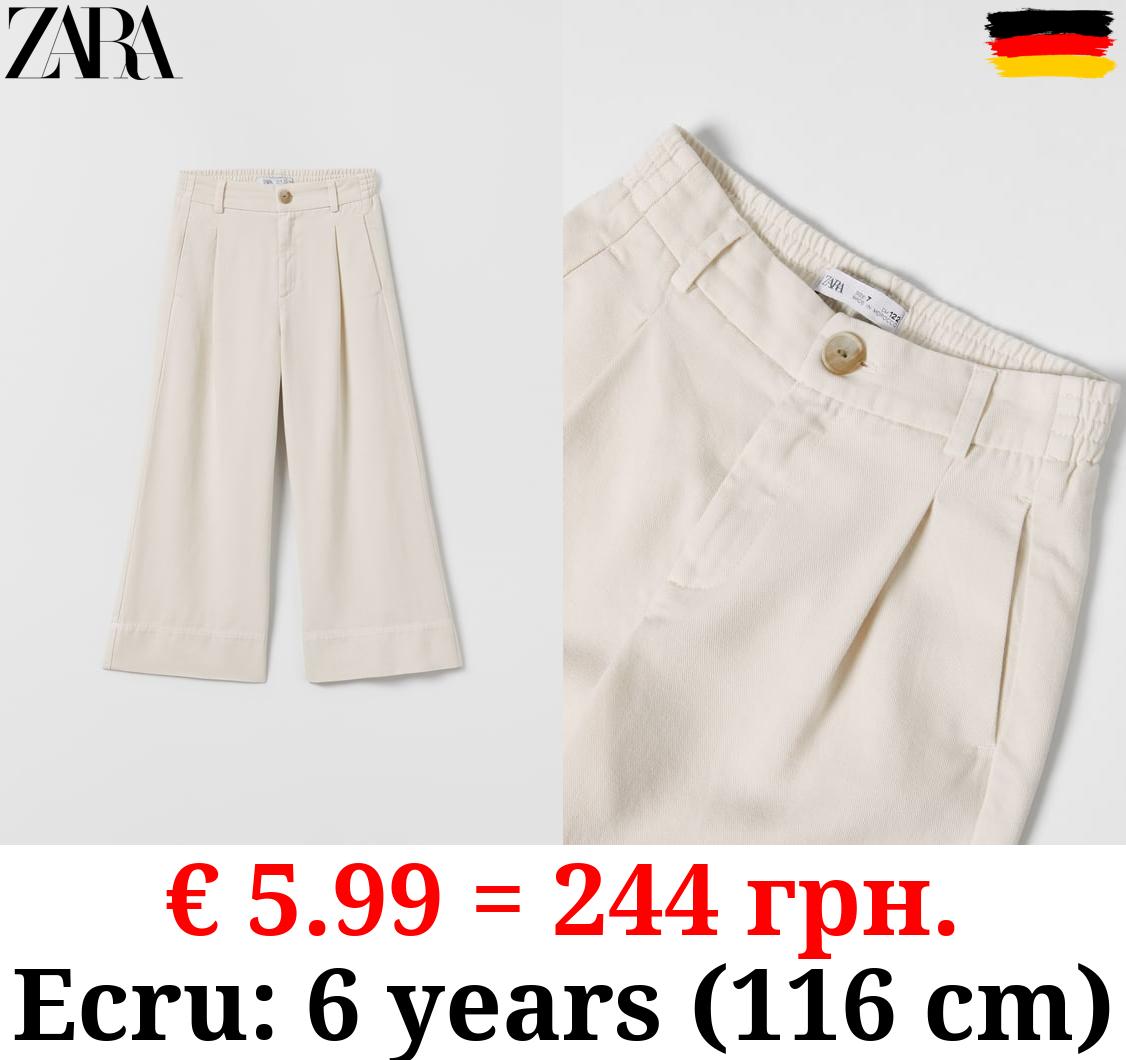 LOOSE-FITTING DARTED TROUSERS