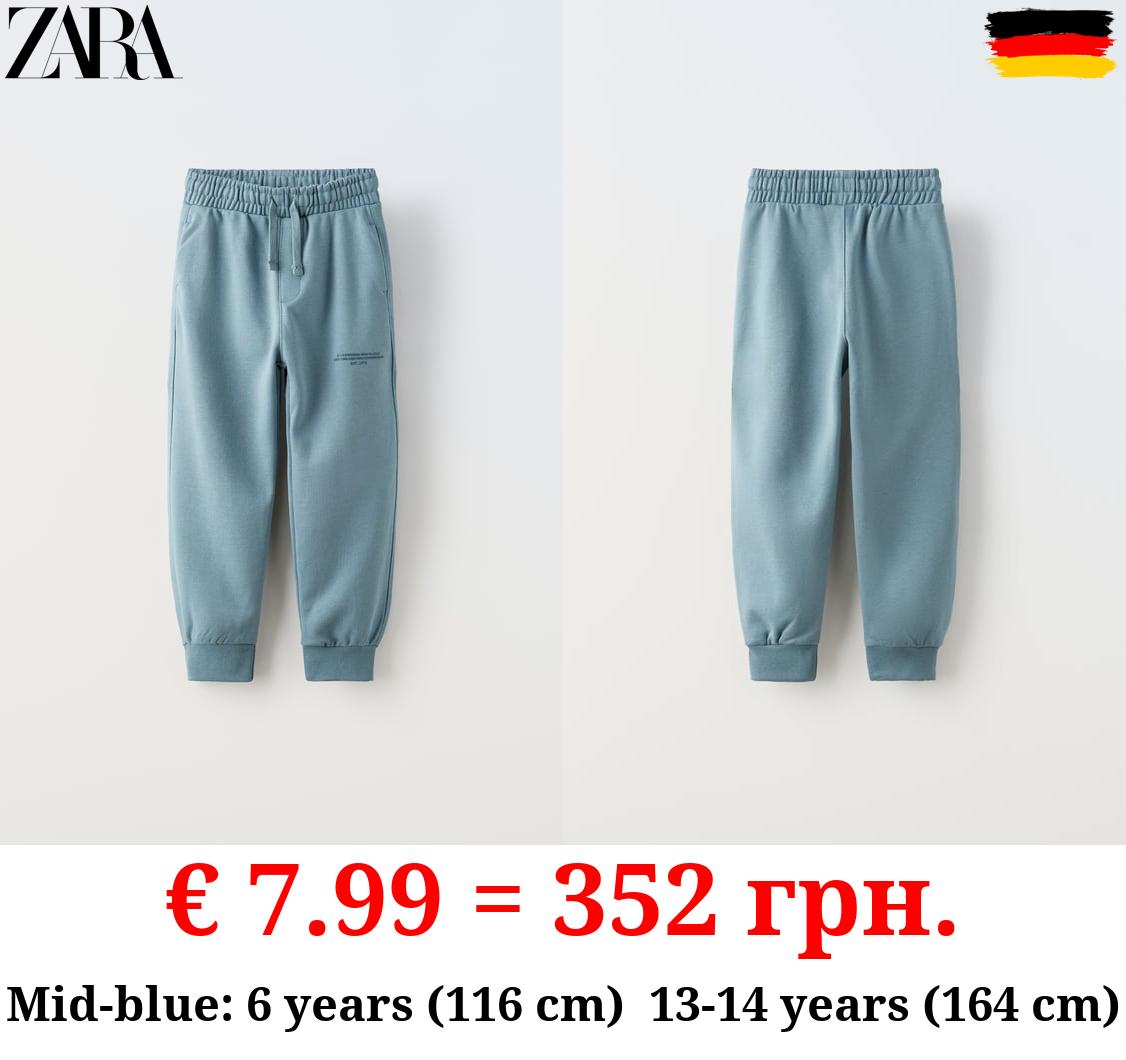 PLUSH TROUSERS WITH SLOGAN