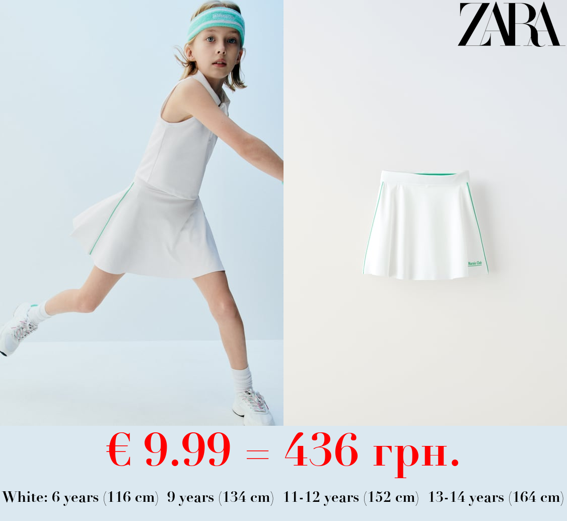 TECHNICAL BERMUDA SKORT WITH TRIMS