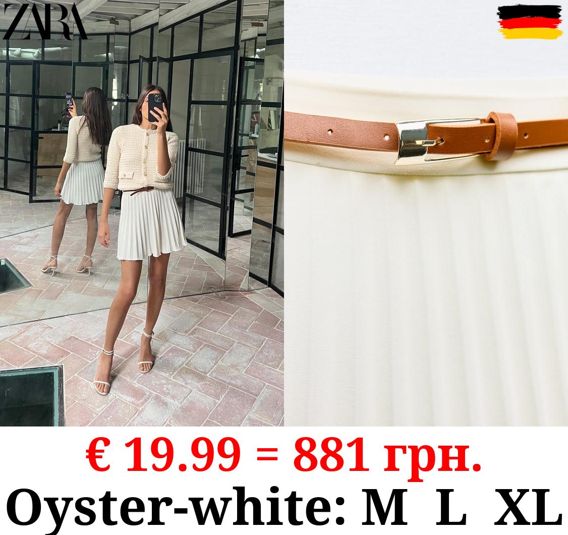 PLEATED MINI SKIRT WITH BELT