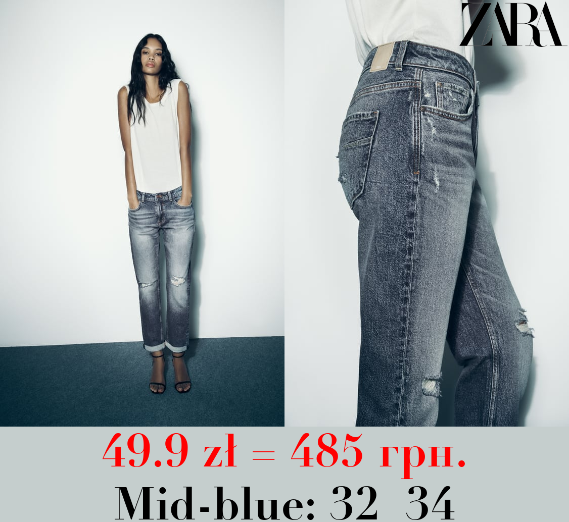 Z1975 RIPPED SPLIT-HEM LOW-RISE JEANS