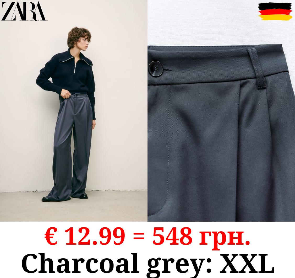 FULL-LENGTH PLEATED TROUSERS