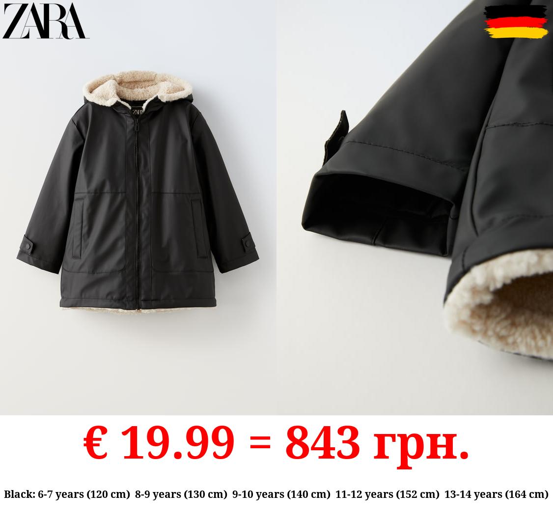 RUBBERISED RAINCOAT WITH FAUX SHEARLING
