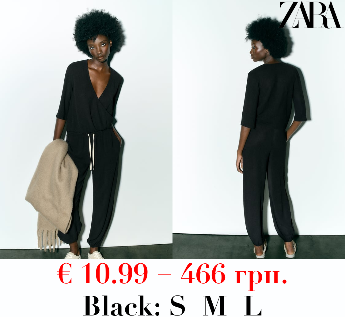 TEXTURED SURPLICE TOP