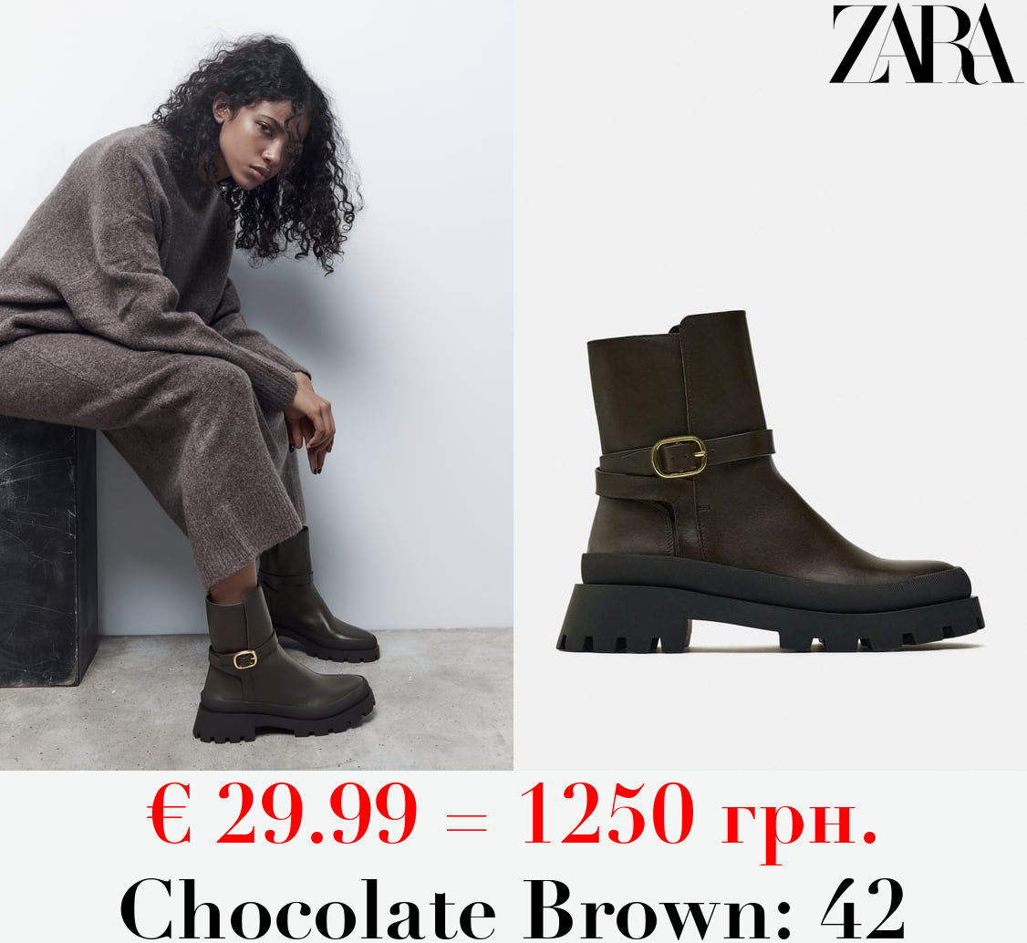 FLAT LEATHER ANKLE BOOTS WITH TRACK SOLE