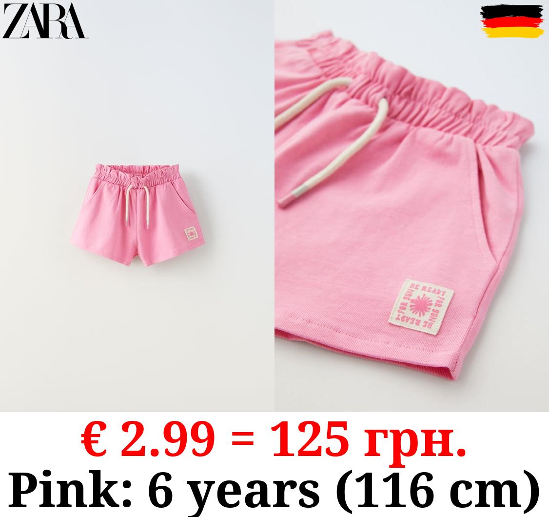 PLUSH BERMUDA SHORTS WITH LABEL DETAIL