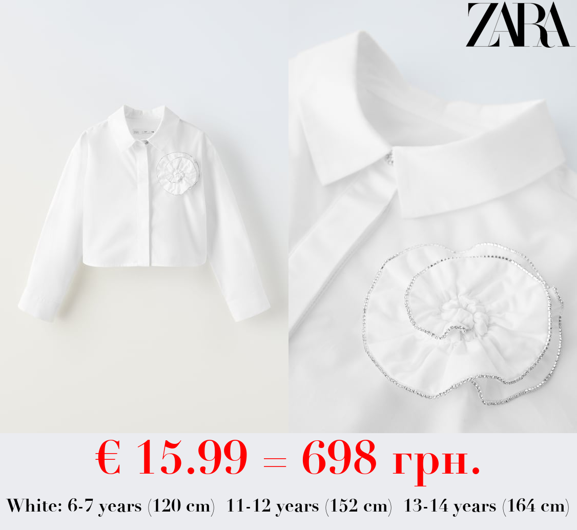 SHIRT WITH SHIMMERY FLOWER DETAIL