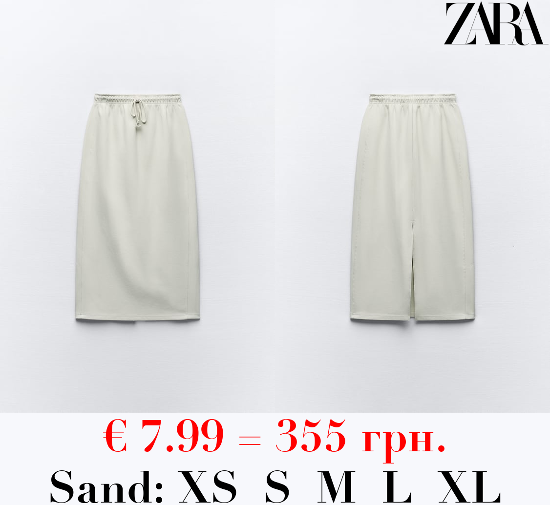 CLEAN INTERLOCK PLUSH MIDI SKIRT